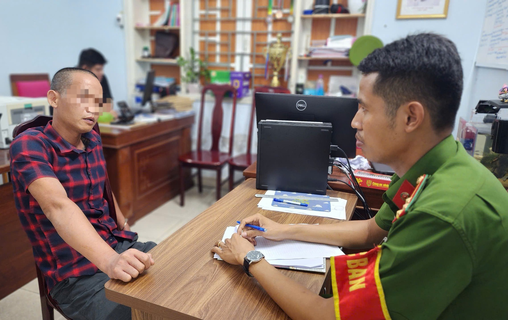 Người phụ nữ bán nước mía bị hàng xóm đâm tử vong- Ảnh 1.