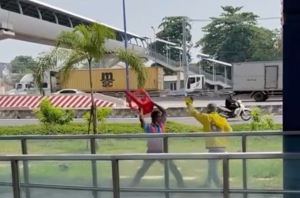 Làm rõ vụ 2 người cầm ghế đánh nhau gần nhà ga Thủ Đức- Ảnh 1.