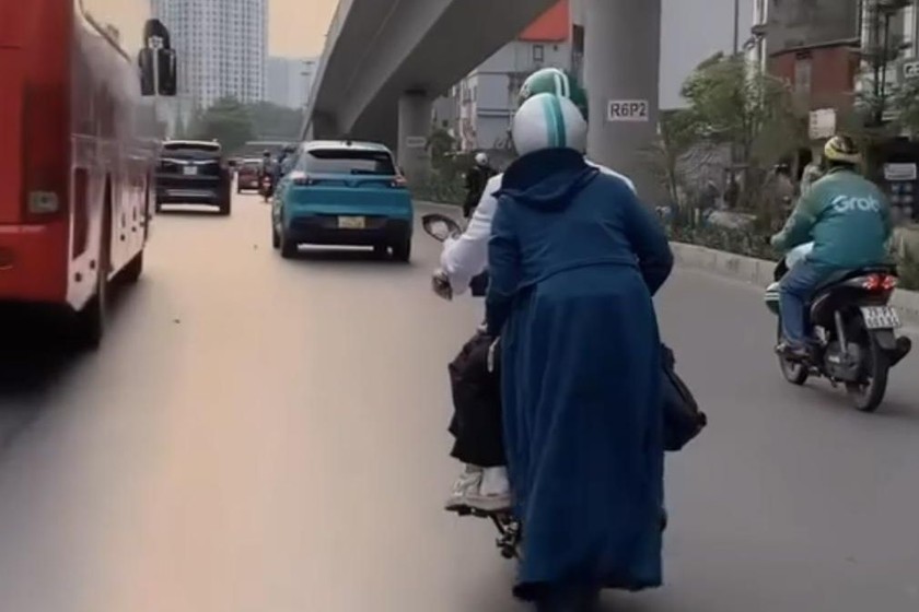 17-9615-504-3083 Sử dụng áo chống nắng không đúng cách rất dễ dẫn đến TNGT. Ảnh: nguồn internet